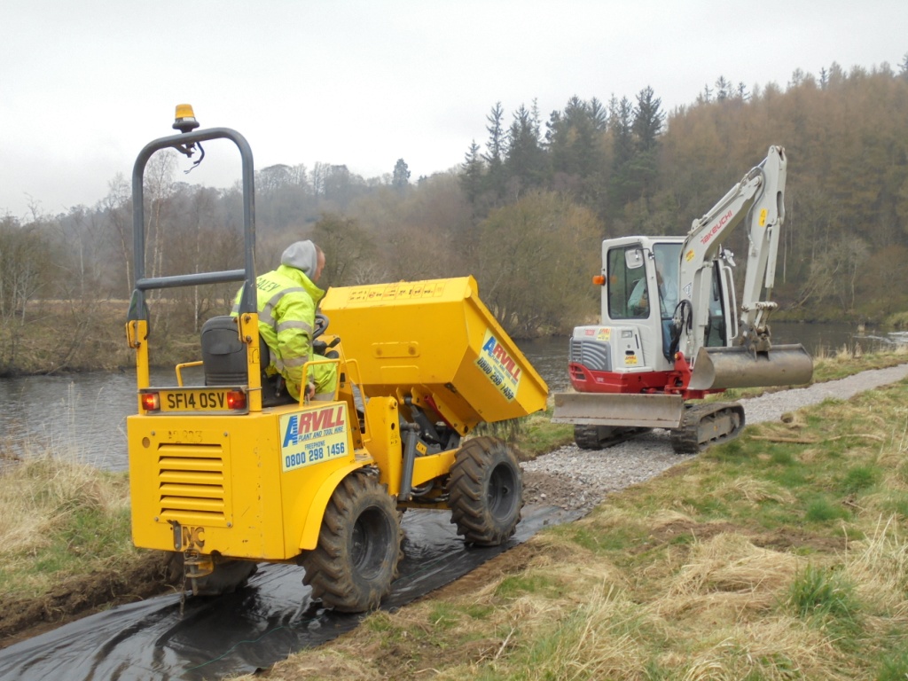 Contracters at work on the restored section of Clyde Walkway at Mauldslie Woods