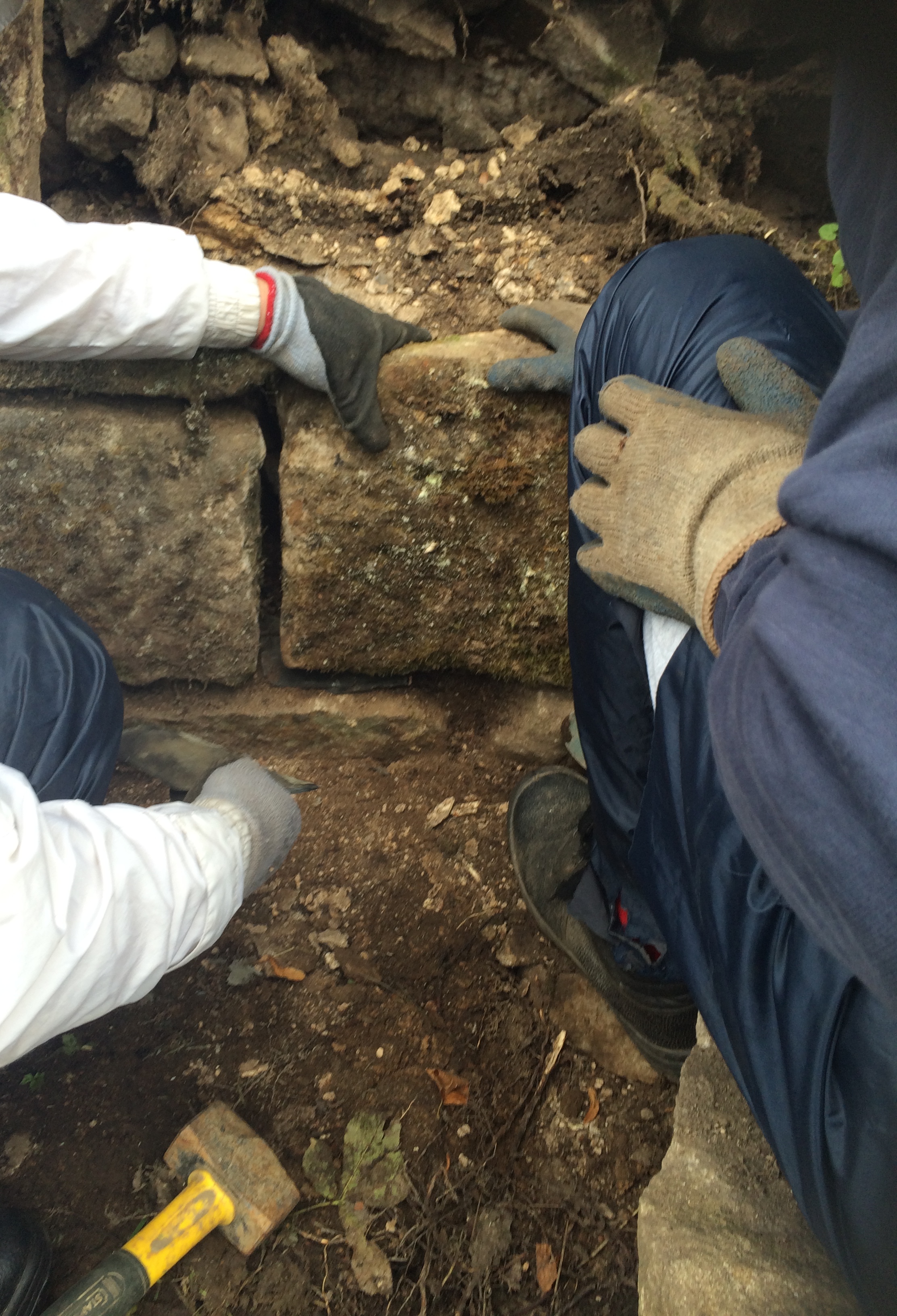 Volunteers undertake careful restoration of the ha-ha stonework